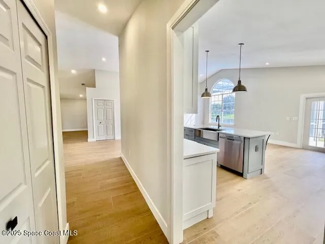 a view of a kitchen cabinets and a center island