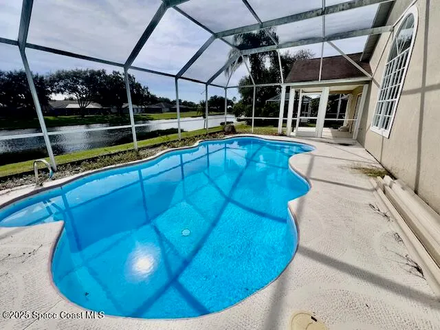a view of a house with a swimming pool