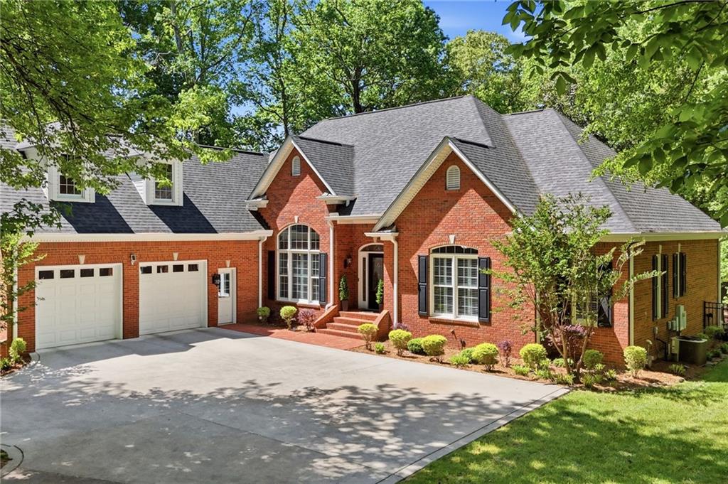 153 York Place Calhoun, GA 30701 - Photo 2 of 78 a front view of a house with a yard