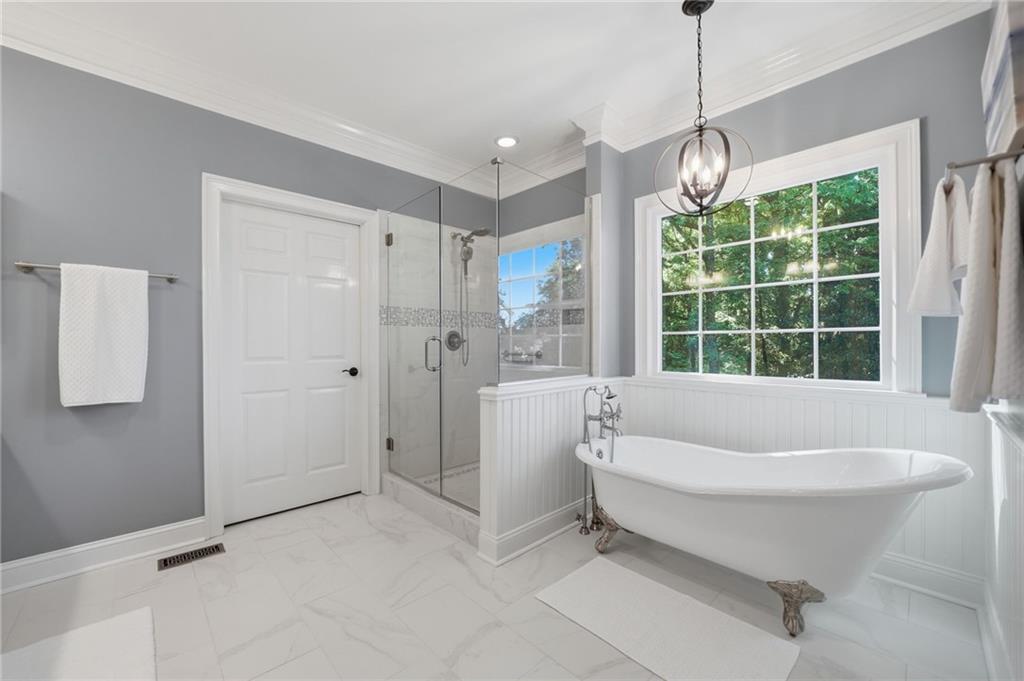 153 York Place Calhoun, GA 30701 - Photo 24 of 78 a bathroom with a bathtub and a shower