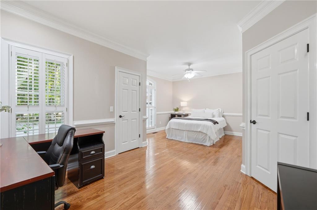 153 York Place Calhoun, GA 30701 - Photo 27 of 78 a bedroom with a bed and wooden floor