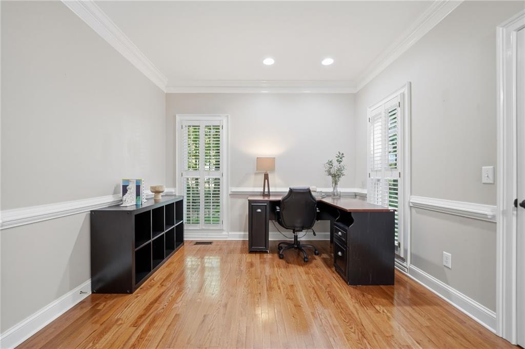 153 York Place Calhoun, GA 30701 - Photo 29 of 78 a view of a workspace with furniture and wooden floor
