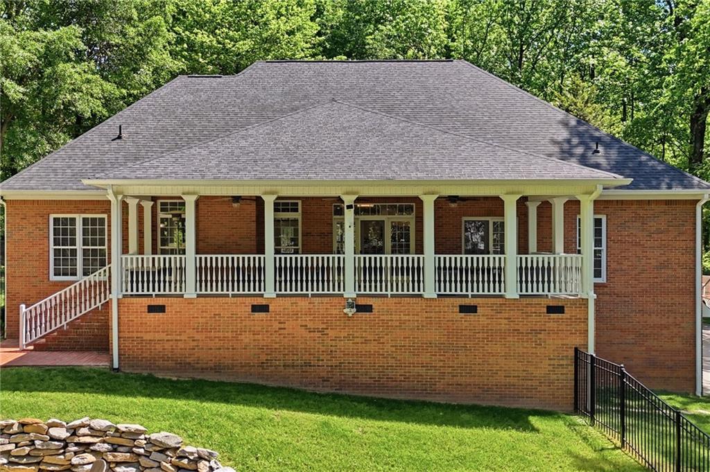 153 York Place Calhoun, GA 30701 - Photo 54 of 78 a front view of a house with a yard