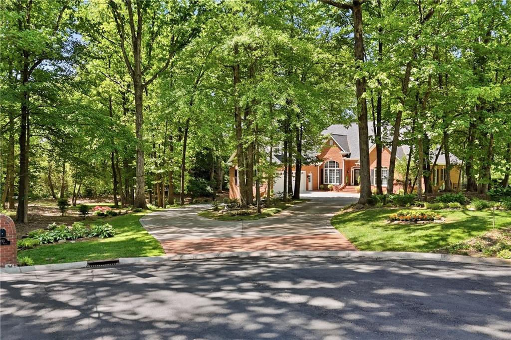 153 York Place Calhoun, GA 30701 - Photo 58 of 78 a view of a trees in front of a house