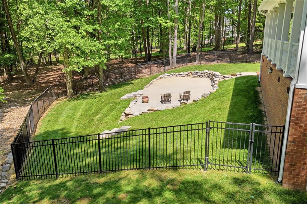 153 York Place Calhoun, GA 30701 - Photo 70 of 78 a view of a backyard with a garden
