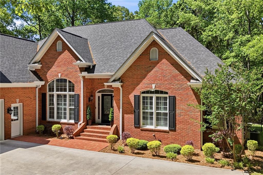 153 York Place Calhoun, GA 30701 - Photo 75 of 78 a front view of a house with a yard