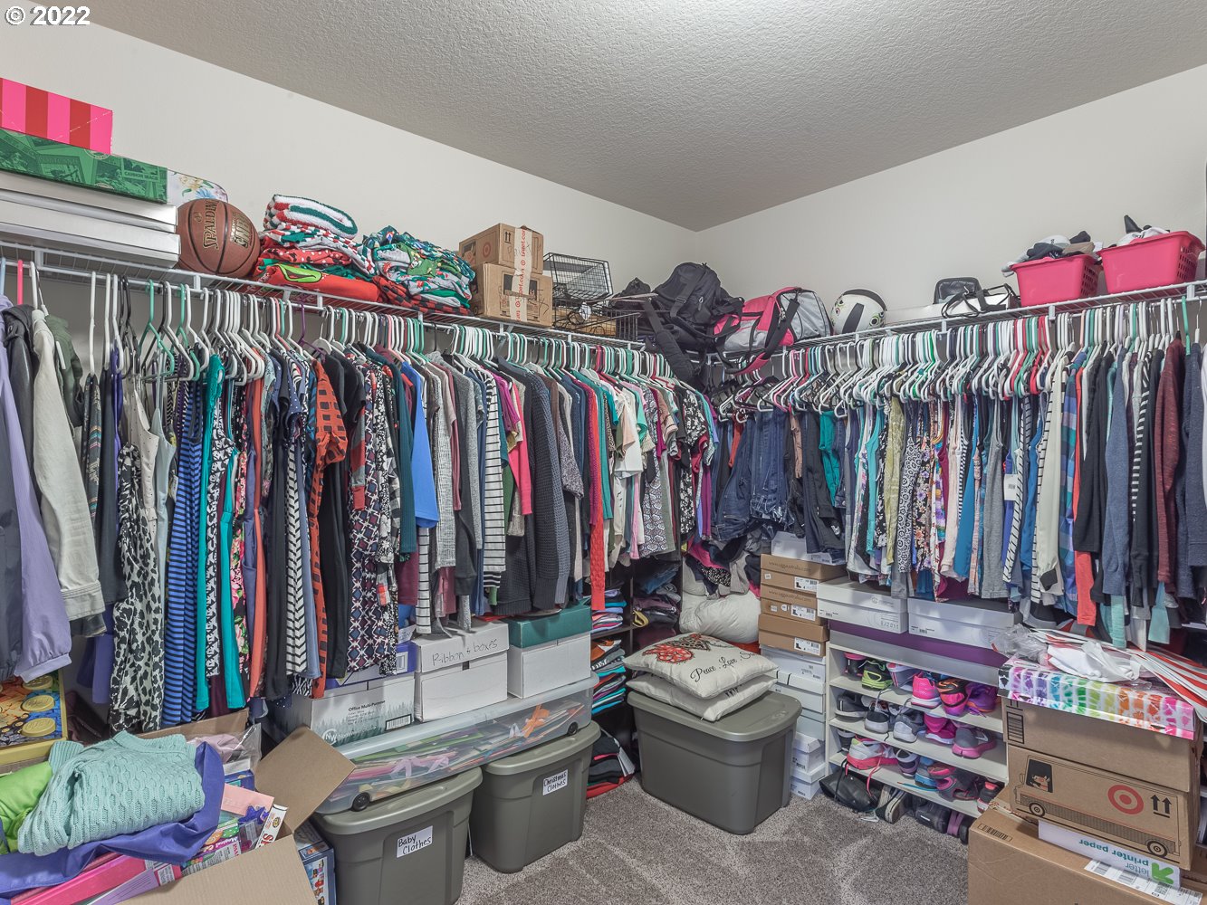 17656 Southeast Pinnacles Street Damascus, OR 97089 - Photo 18 of 31 a view of walk in closet with clothes
