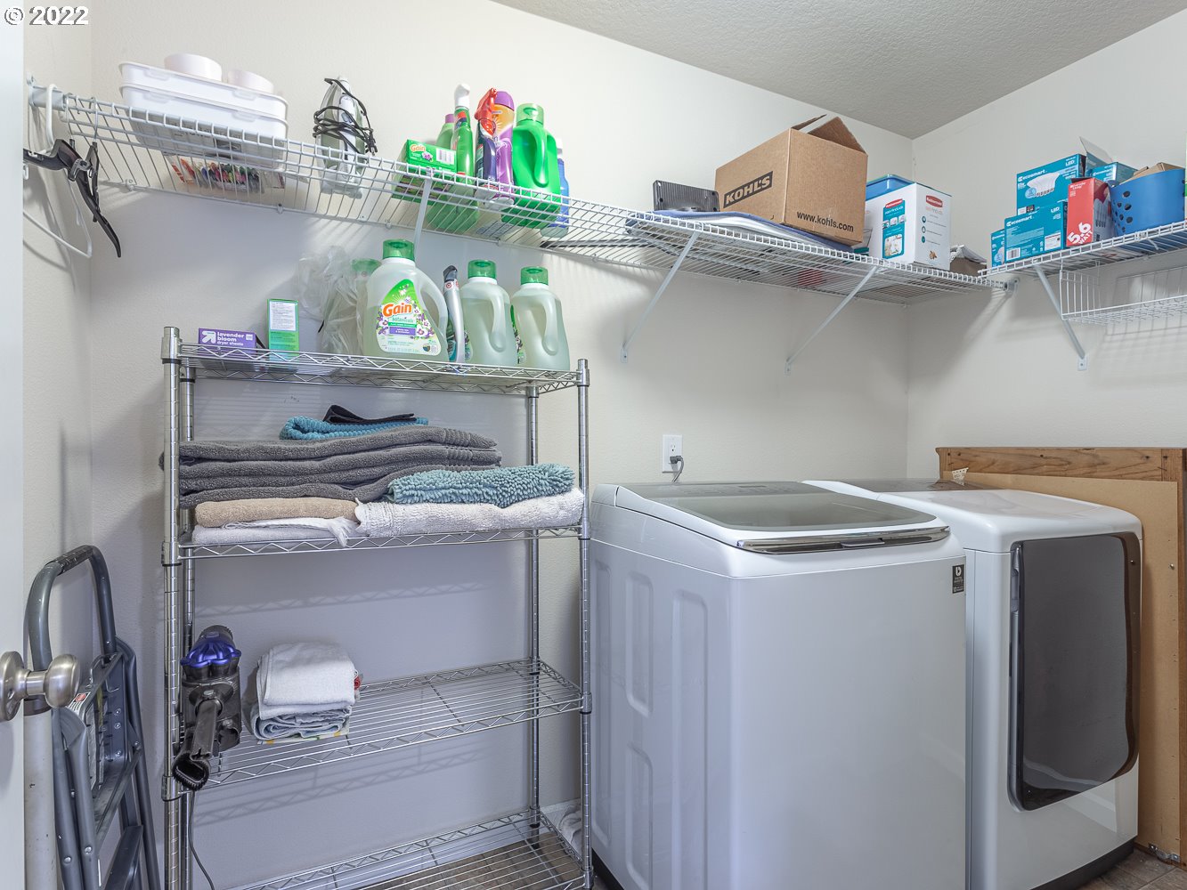 17656 Southeast Pinnacles Street Damascus, OR 97089 - Photo 27 of 31 a utility room with washer and dryer