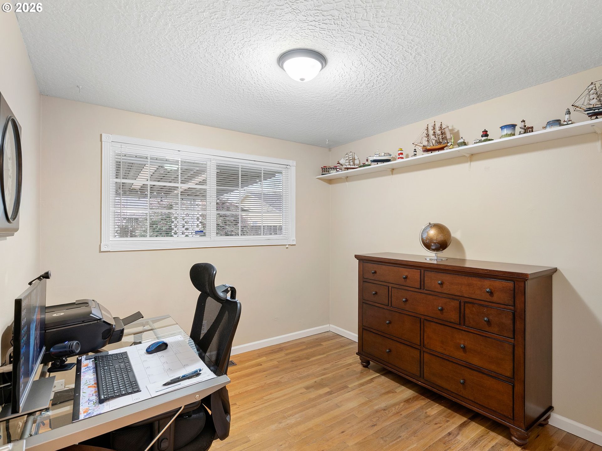 2036 Sallal Road Woodburn, OR 97071 - Photo 12 of 25 a view of a workspace with furniture and a window