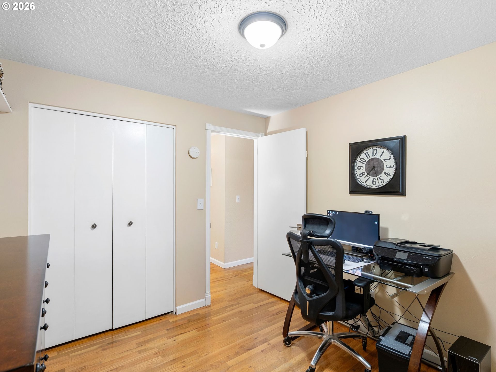 2036 Sallal Road Woodburn, OR 97071 - Photo 13 of 25 a view of a workspace with furniture and wooden floor