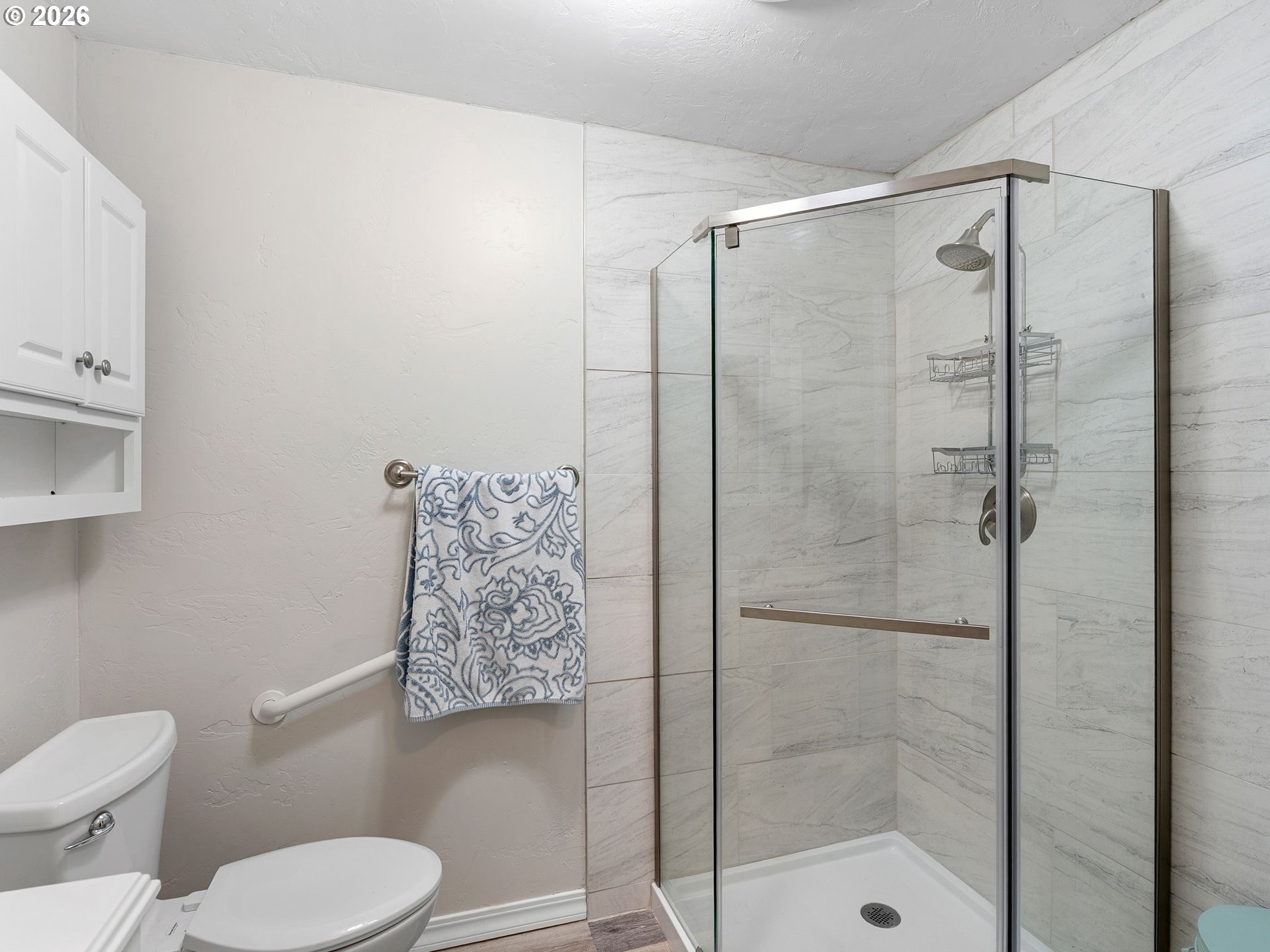 2036 Sallal Road Woodburn, OR 97071 - Photo 18 of 25 a white toilet sitting next to a bathroom