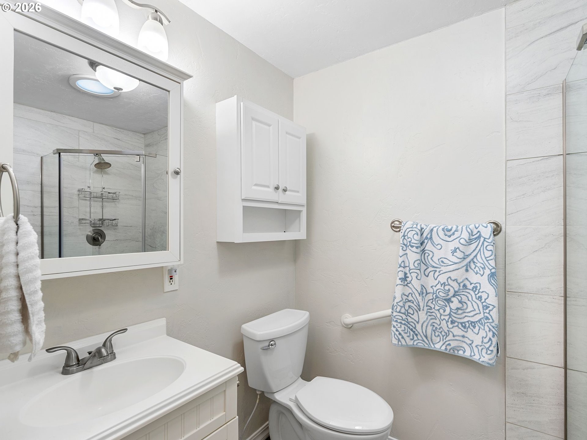 2036 Sallal Road Woodburn, OR 97071 - Photo 19 of 25 a bathroom with a toilet sink and mirror