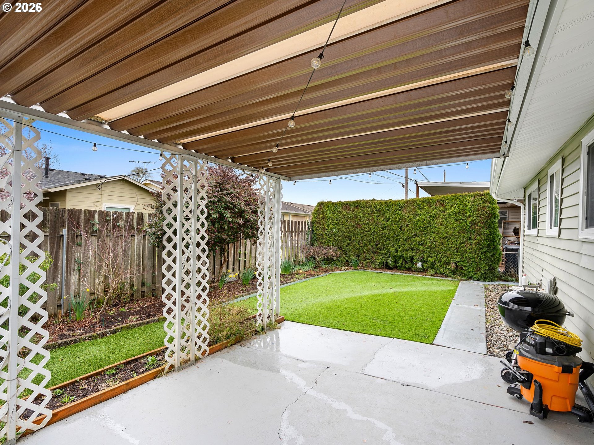 2036 Sallal Road Woodburn, OR 97071 - Photo 20 of 25 a view of a chair and table in the back yard of the house