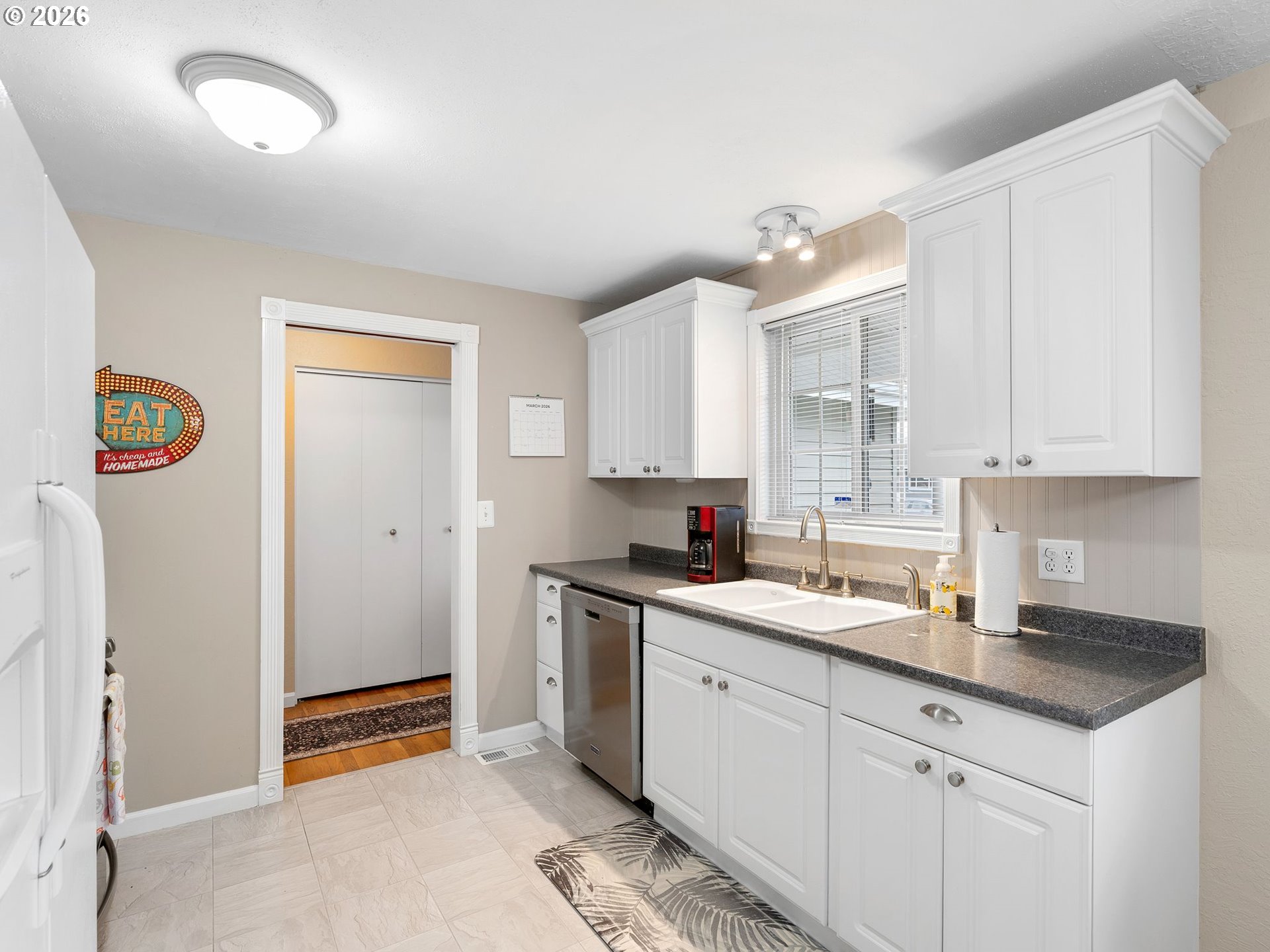 2036 Sallal Road Woodburn, OR 97071 - Photo 4 of 25 a kitchen with granite countertop a sink stainless steel appliances and cabinets