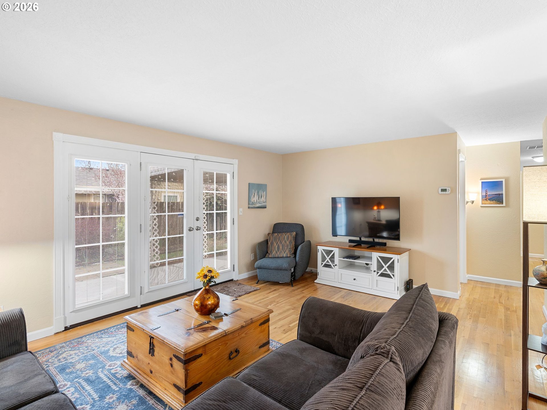 2036 Sallal Road Woodburn, OR 97071 - Photo 9 of 25 a living room with furniture and a flat screen tv