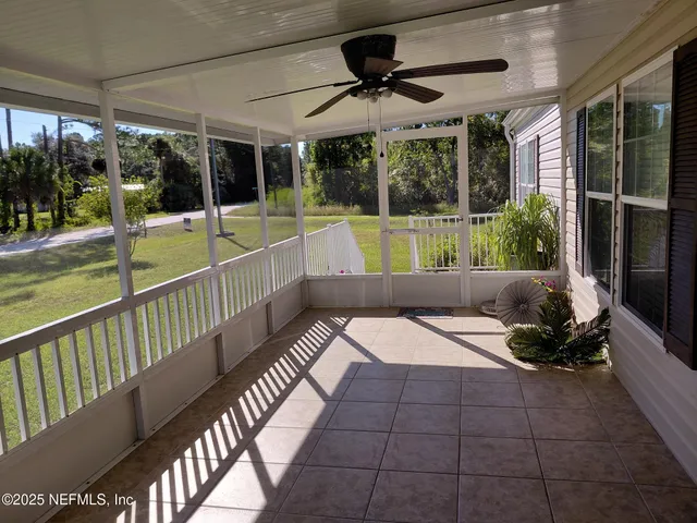 a view of swimming pool with seating space