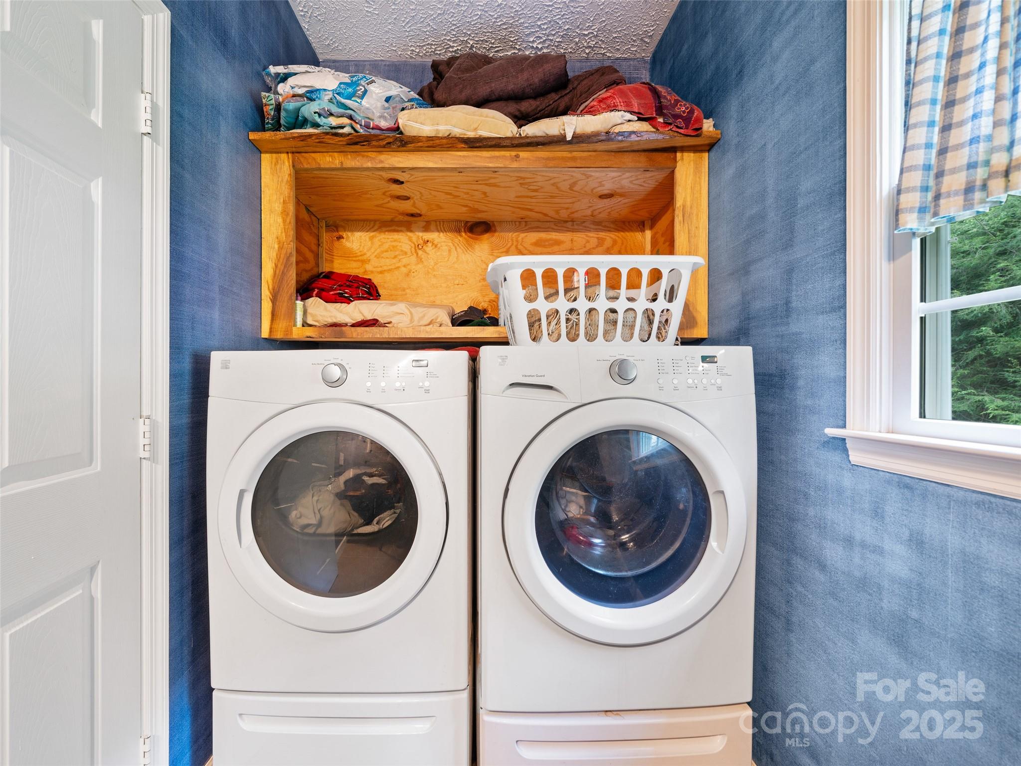 2216 Beans Creek Road Bakersville, NC 28705 - Photo 21 of 39 a utility room with dryer and washer