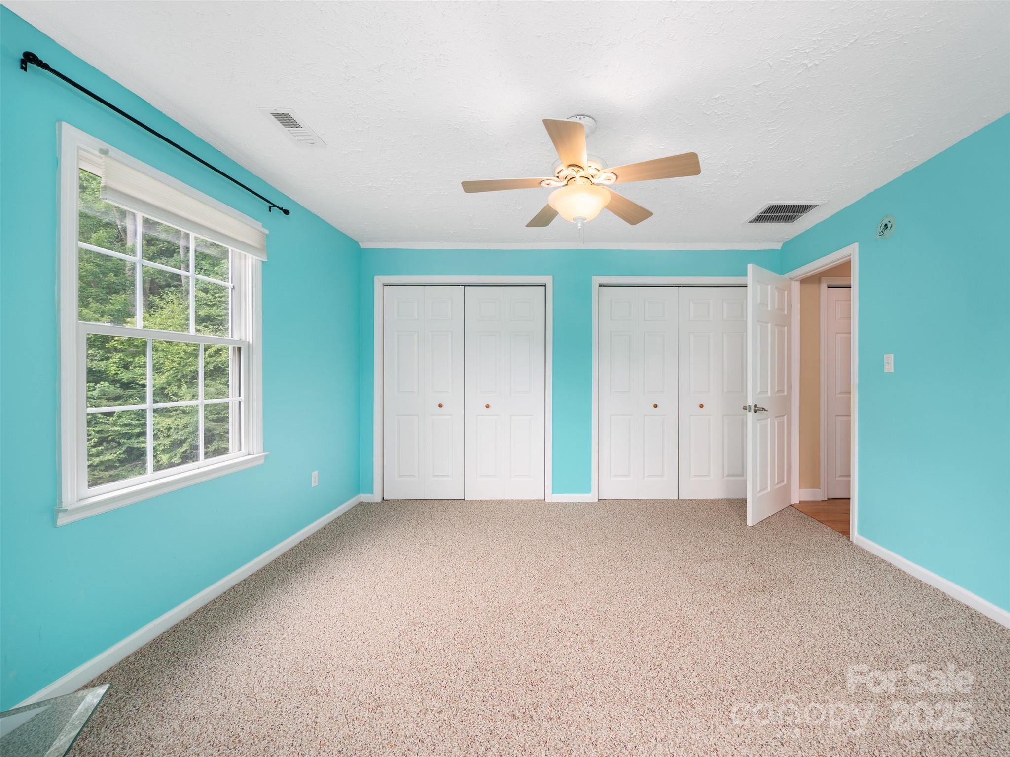 2216 Beans Creek Road Bakersville, NC 28705 - Photo 25 of 39 a view of an empty room with a window