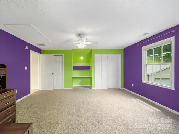 a view of a livingroom with furniture and window
