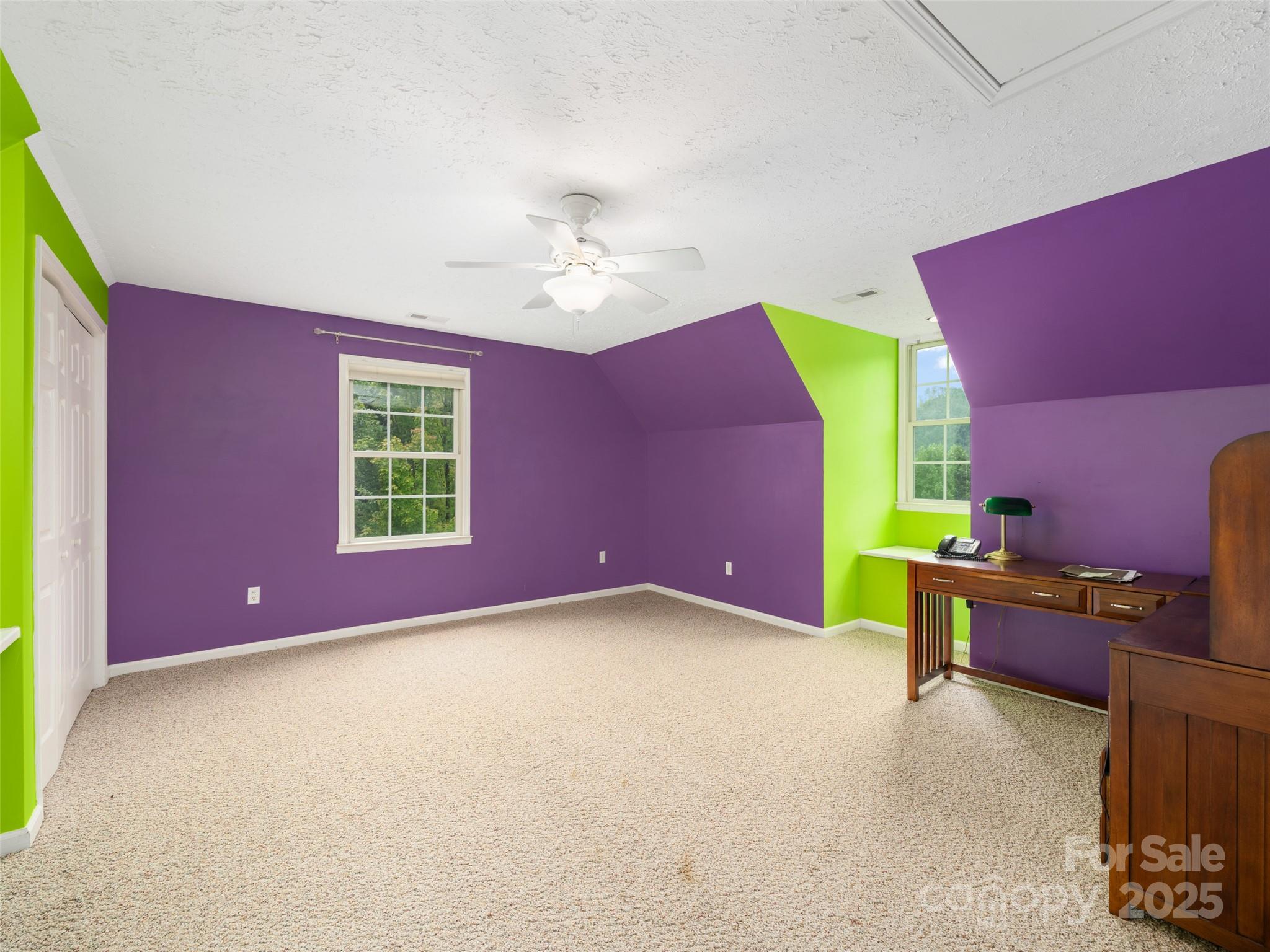 2216 Beans Creek Road Bakersville, NC 28705 - Photo 27 of 39 a view of a livingroom with a workspace