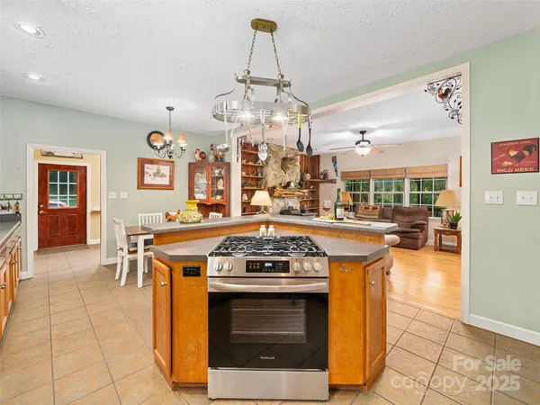 a kitchen with a stove and a sink