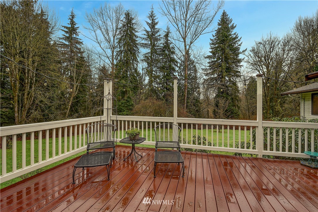 22217 61st Avenue Southeast Bothell, WA 98021 - Photo 27 of 37 a view of balcony with wooden floor and fence