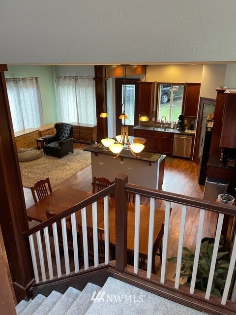 22217 61st Avenue Southeast Bothell, WA 98021 - Photo 31 of 37 a view of a couches and dinning table and chairs in the balcony