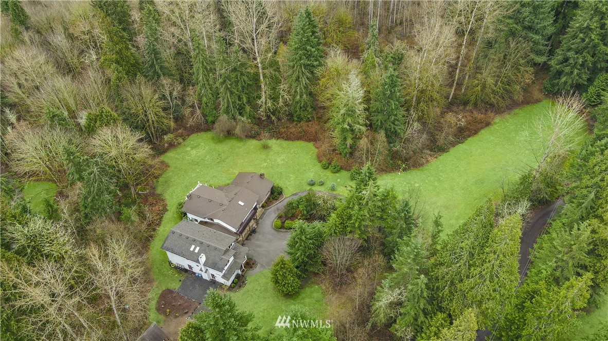 22217 61st Avenue Southeast Bothell, WA 98021 - Photo 37 of 37 an aerial view of a house with a yard