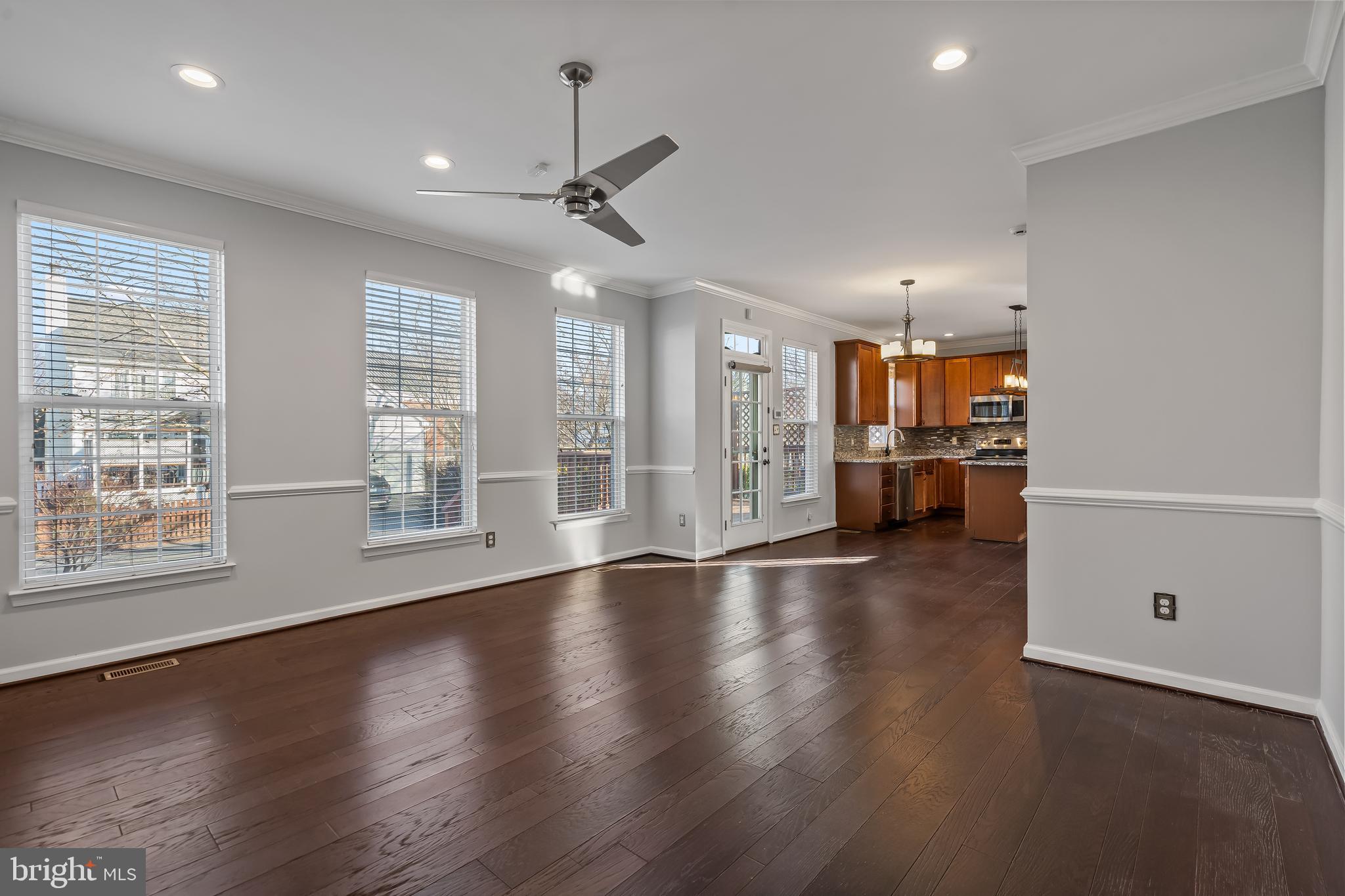43112 Demerrit Street Chantilly, VA 20152 - Photo 21 of 42 a view of an empty room with a window and wooden floor