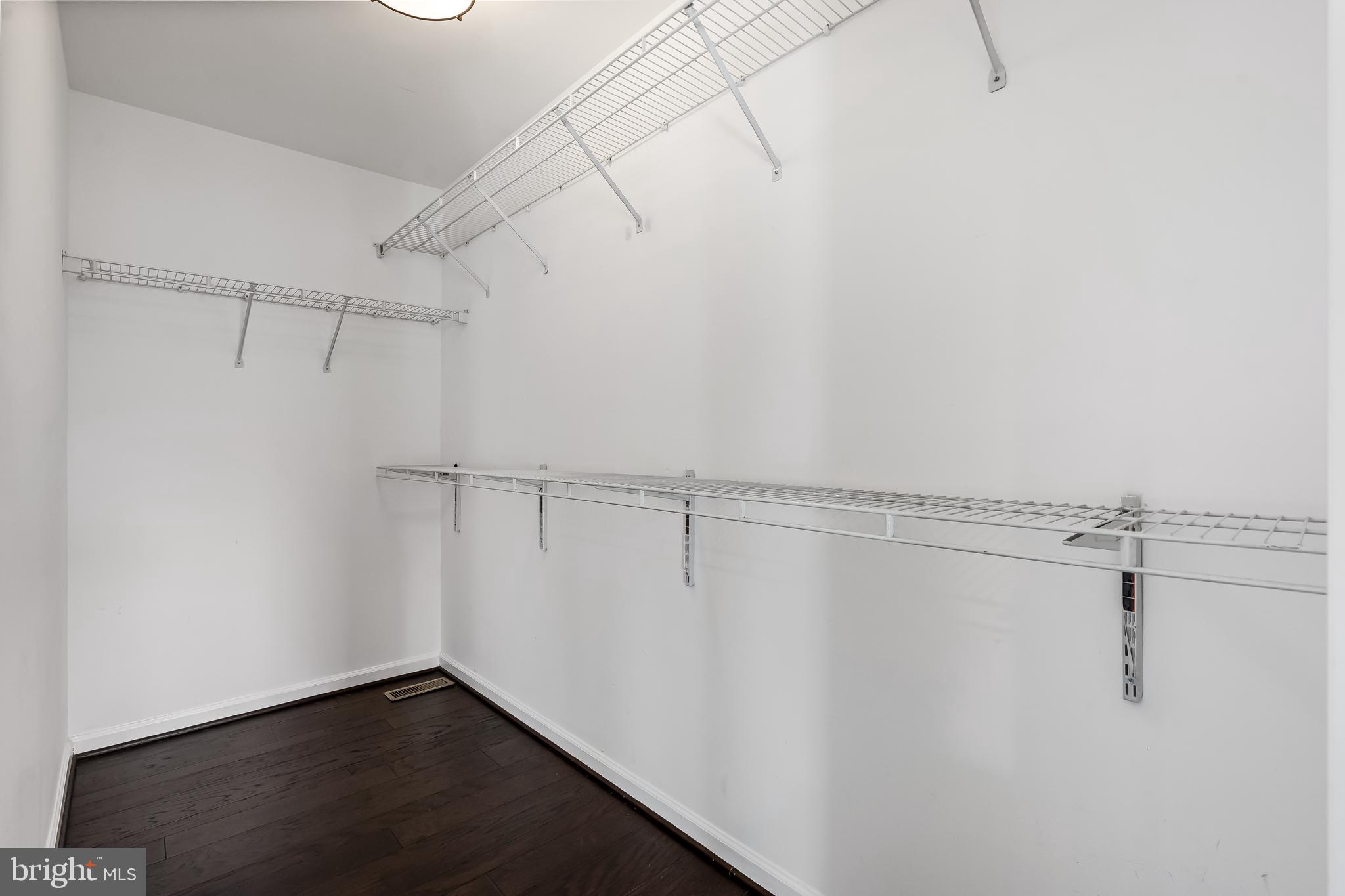 43112 Demerrit Street Chantilly, VA 20152 - Photo 29 of 42 a view of a room with racks on the wall
