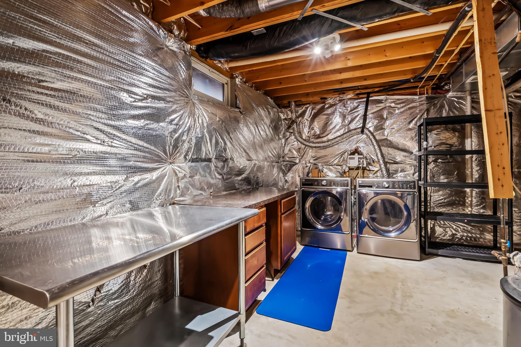 43112 Demerrit Street Chantilly, VA 20152 - Photo 38 of 42 a utility room with dryer and washer