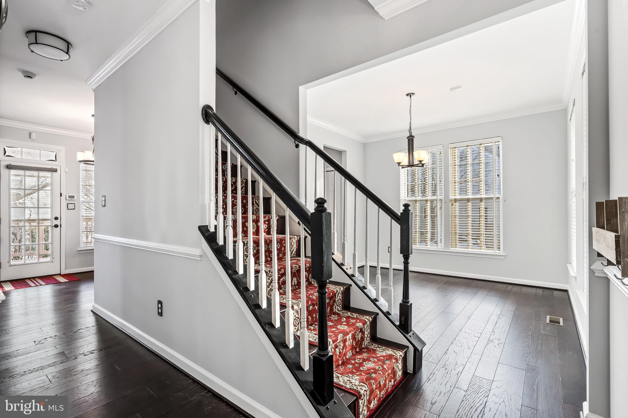43112 Demerrit Street Chantilly, VA 20152 - Photo 5 of 42 a view of an entryway with wooden floor