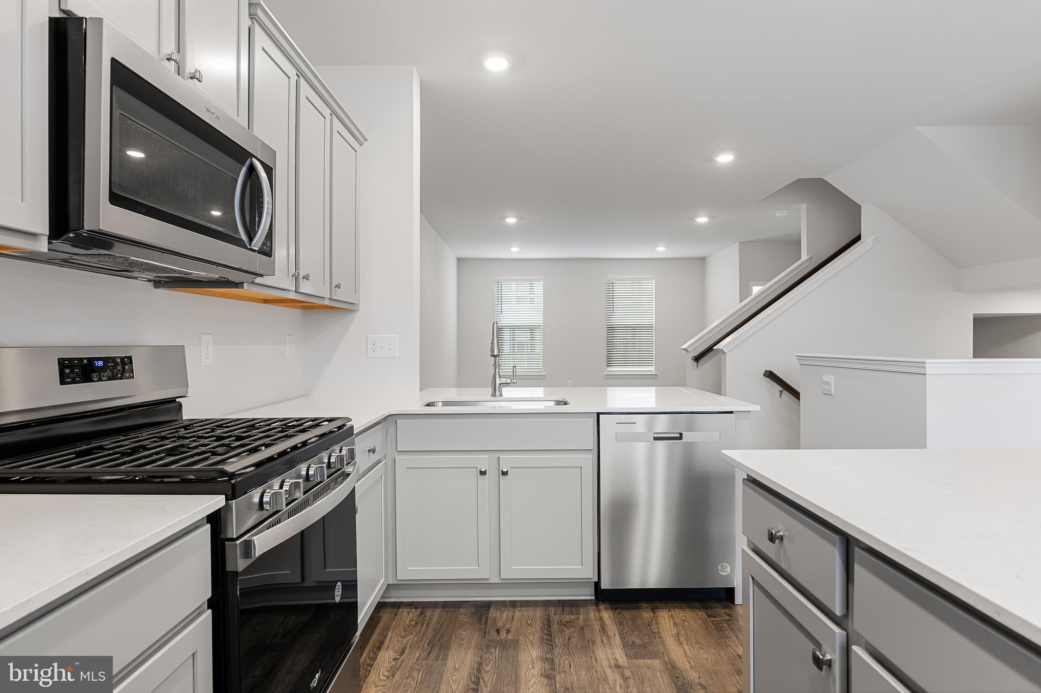 10 Sisters Farmstead Road Mount Laurel, NJ 08054 - Photo 17 of 35 a kitchen with a sink stove and microwave