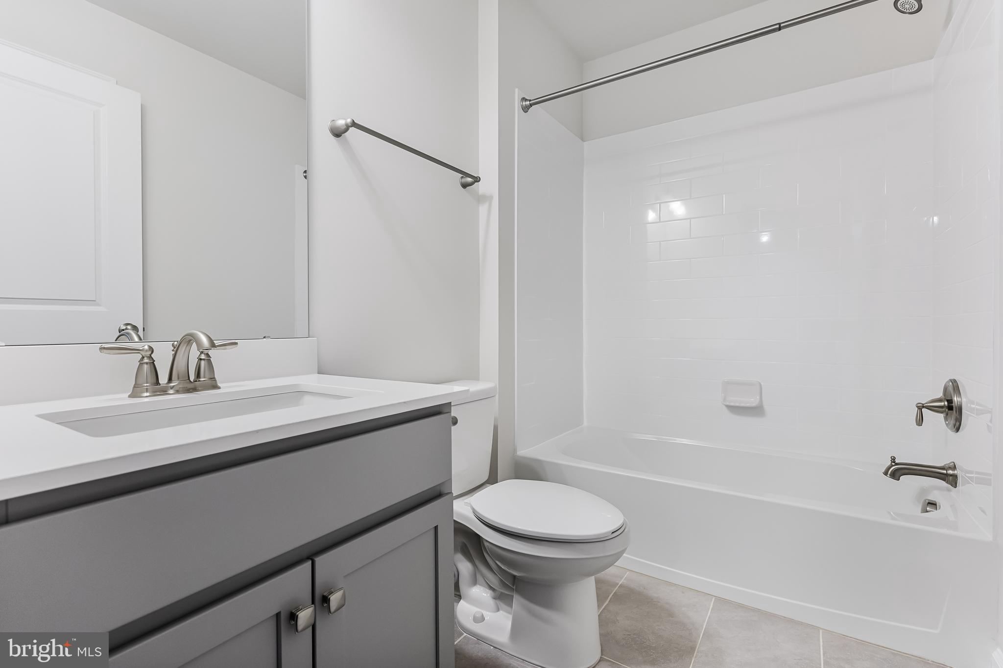 10 Sisters Farmstead Road Mount Laurel, NJ 08054 - Photo 28 of 35 a bathroom with a sink a toilet and shower