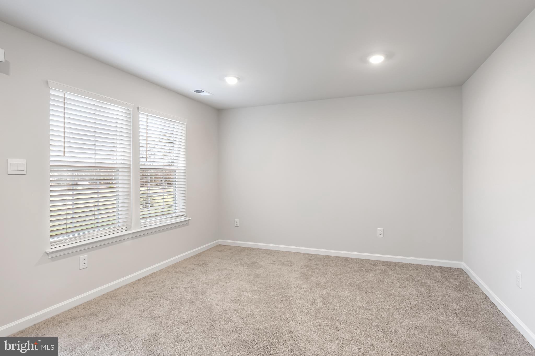 10 Sisters Farmstead Road Mount Laurel, NJ 08054 - Photo 5 of 35 a view of an empty room with a window