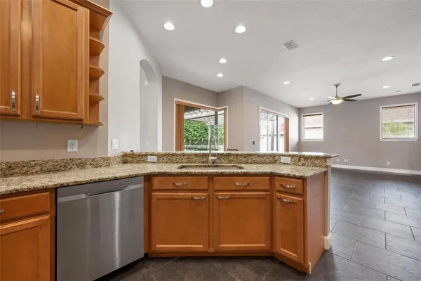a kitchen with lots of counter space and a sink
