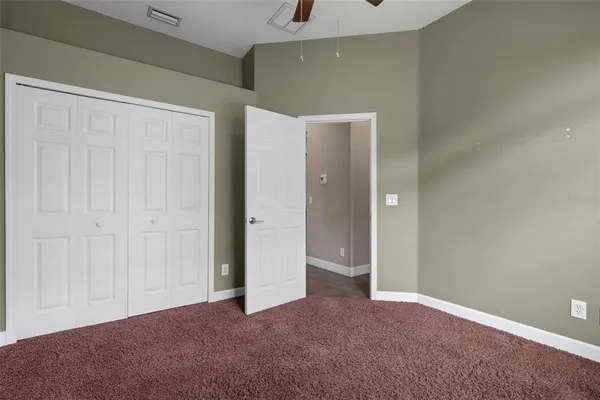 a view of a livingroom with a ceiling fan
