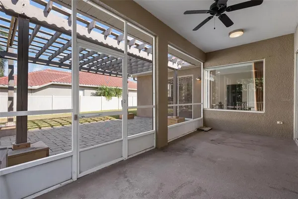 a view of an empty room with a balcony