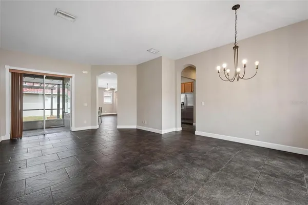 a view of an empty room and window