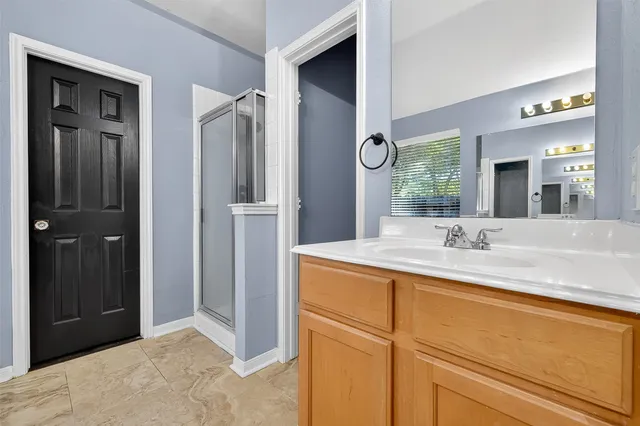 a view of bathroom with a shower