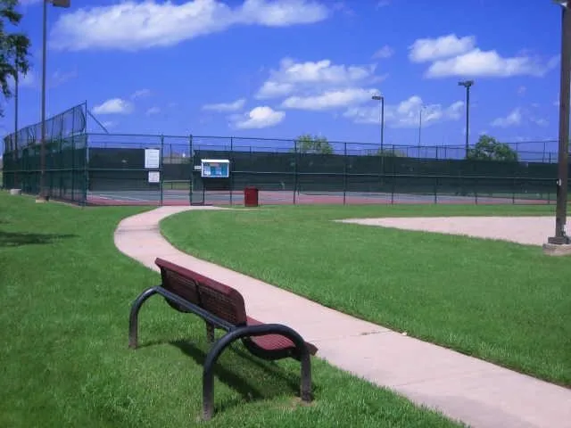 a sign that is on a brick wall