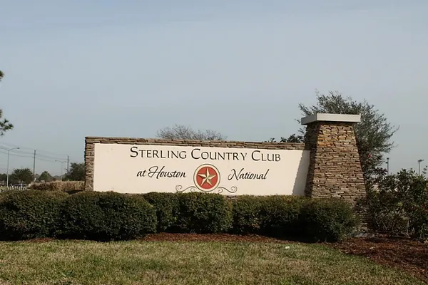 an aerial view of a yard with mountain and lake view