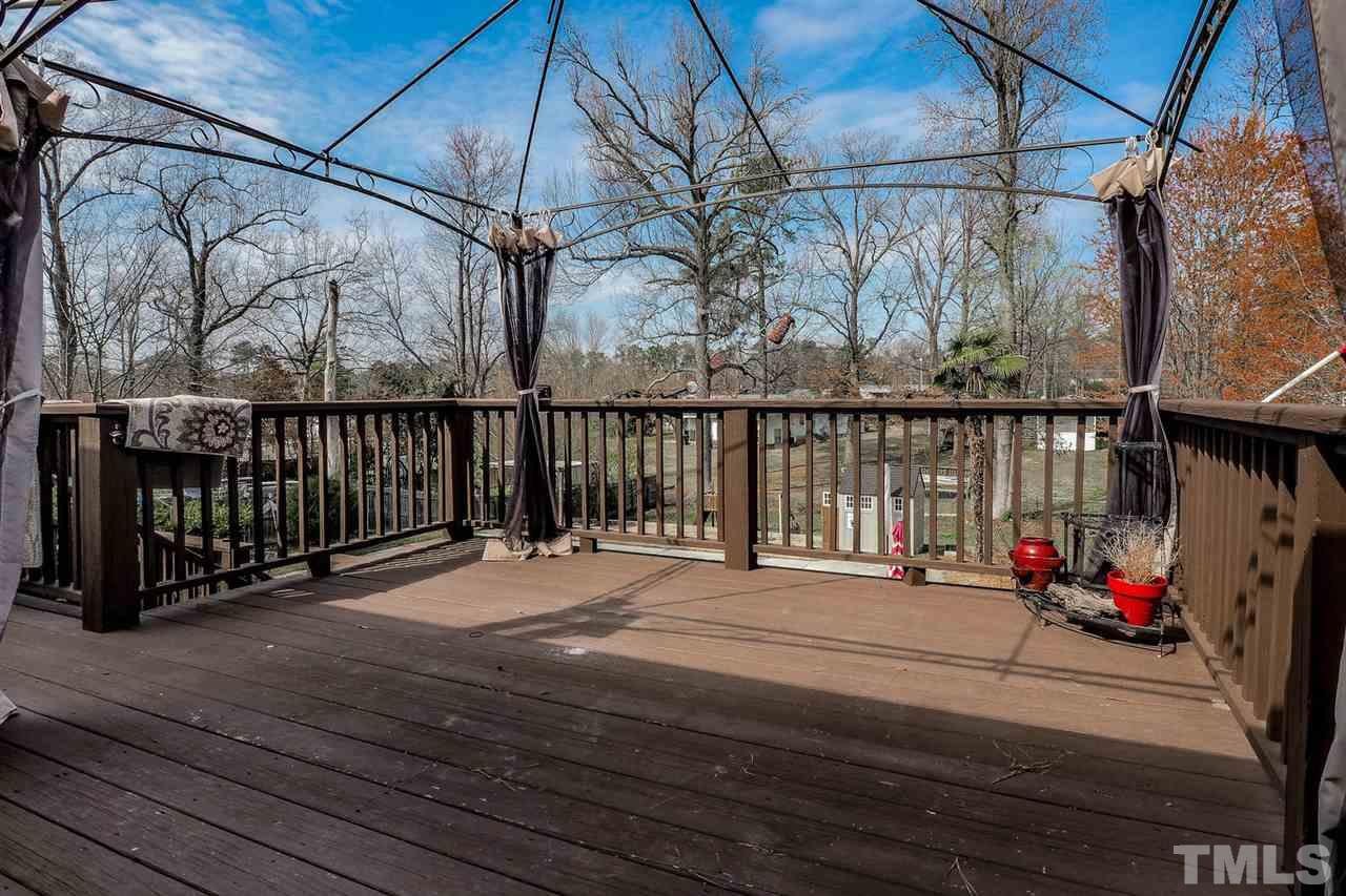 3953 Haithcock Road Raleigh, NC 27604 - Photo 17 of 25 a view of balcony with wooden floor