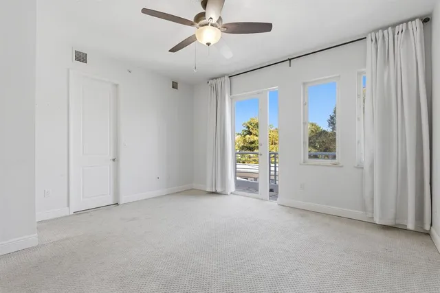 a bathroom with a sink a mirror and a vanity