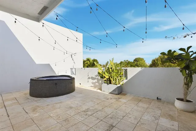 an aerial view of residential building with parking space