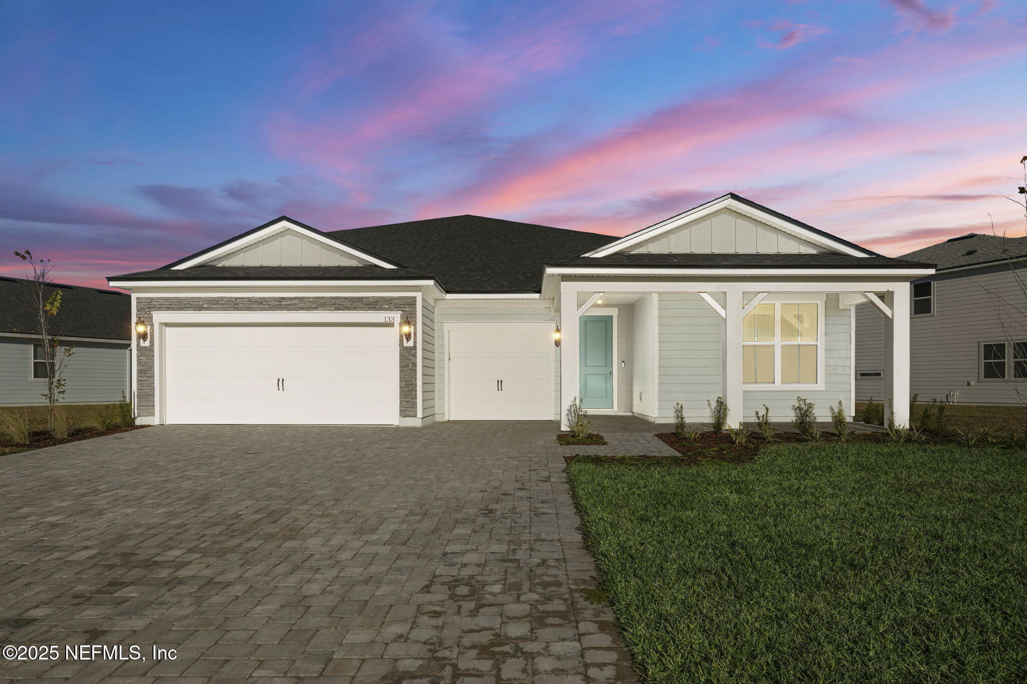 133 Beechnut Circle St. Augustine, FL 32095 - Photo 1 of 53 a front view of a house with a yard and garage