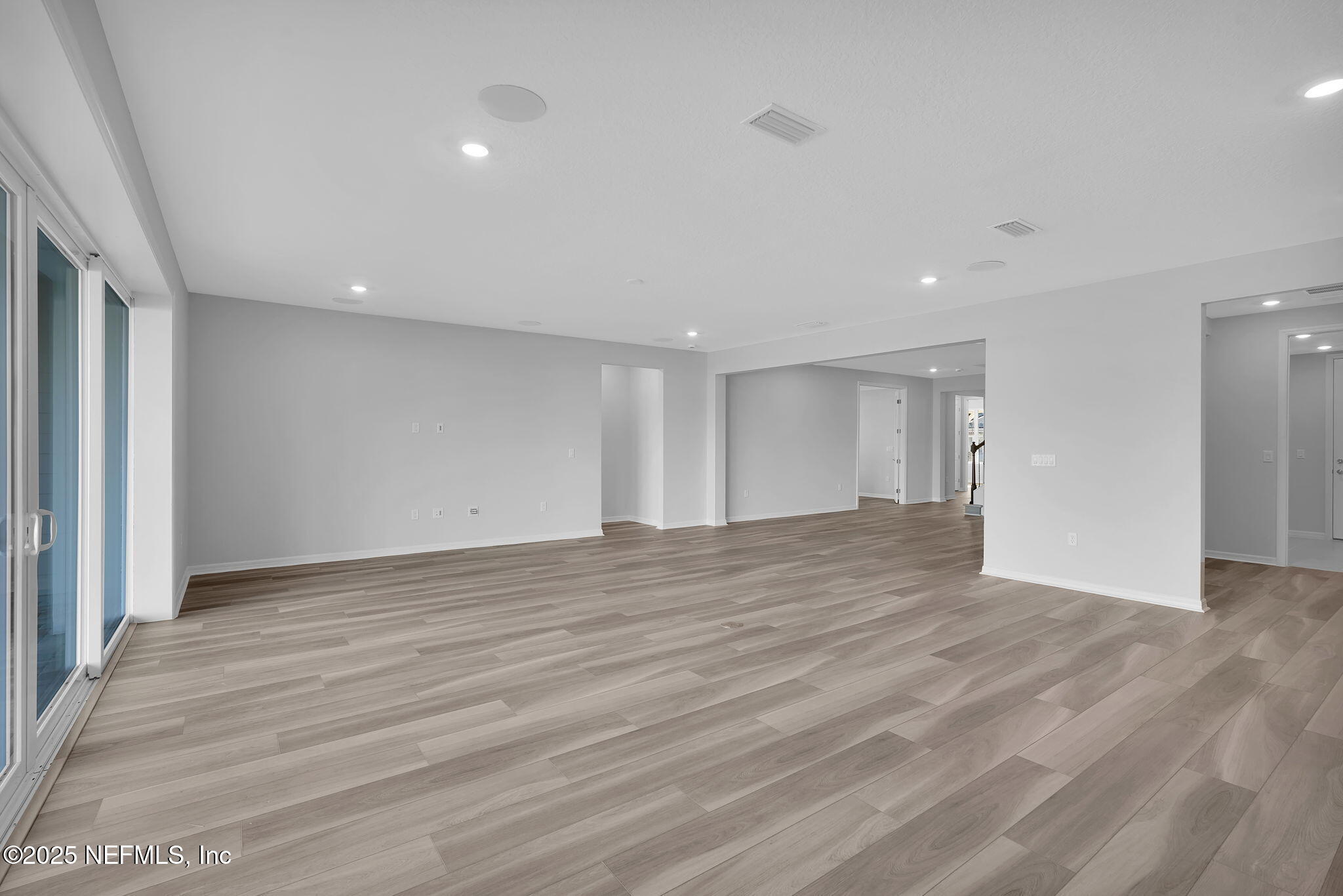 133 Beechnut Circle St. Augustine, FL 32095 - Photo 11 of 53 a view of empty room with wooden floor
