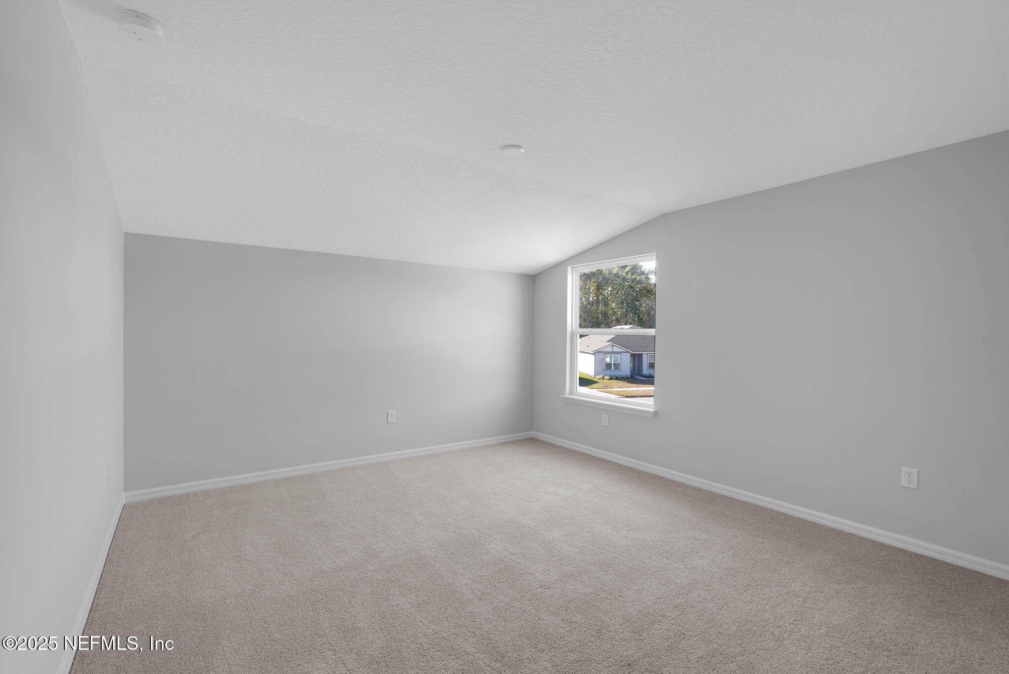 133 Beechnut Circle St. Augustine, FL 32095 - Photo 27 of 53 an empty room with windows