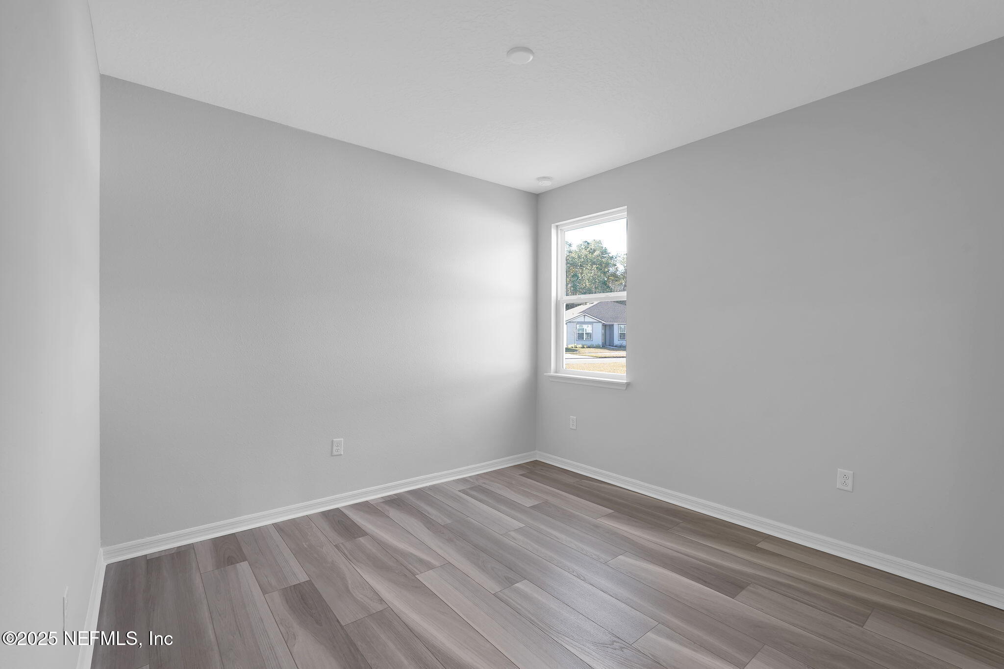 133 Beechnut Circle St. Augustine, FL 32095 - Photo 32 of 53 wooden floor in an empty room