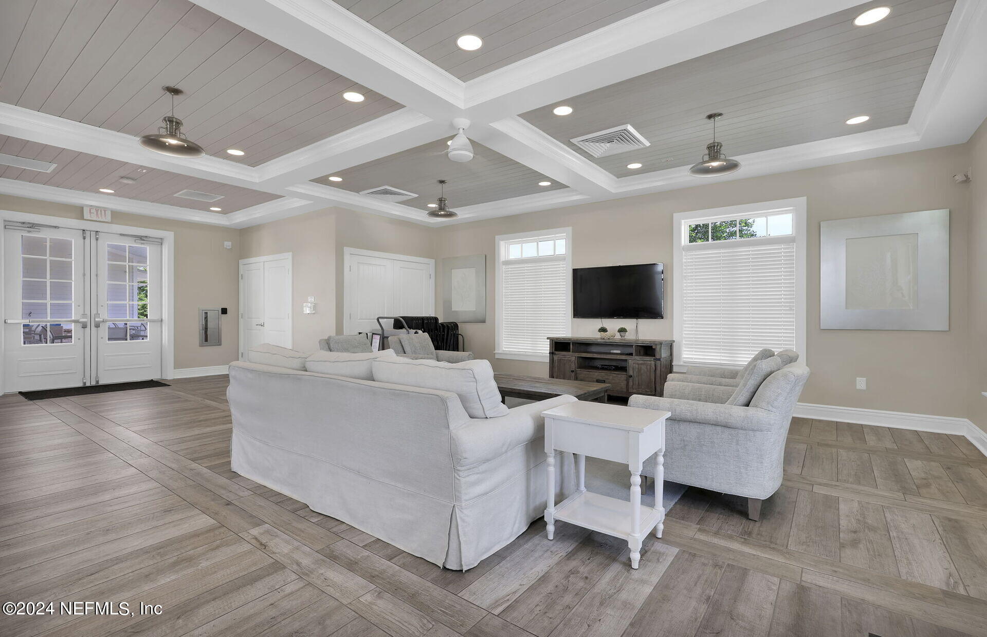 133 Beechnut Circle St. Augustine, FL 32095 - Photo 38 of 53 a living room with furniture and a flat screen tv